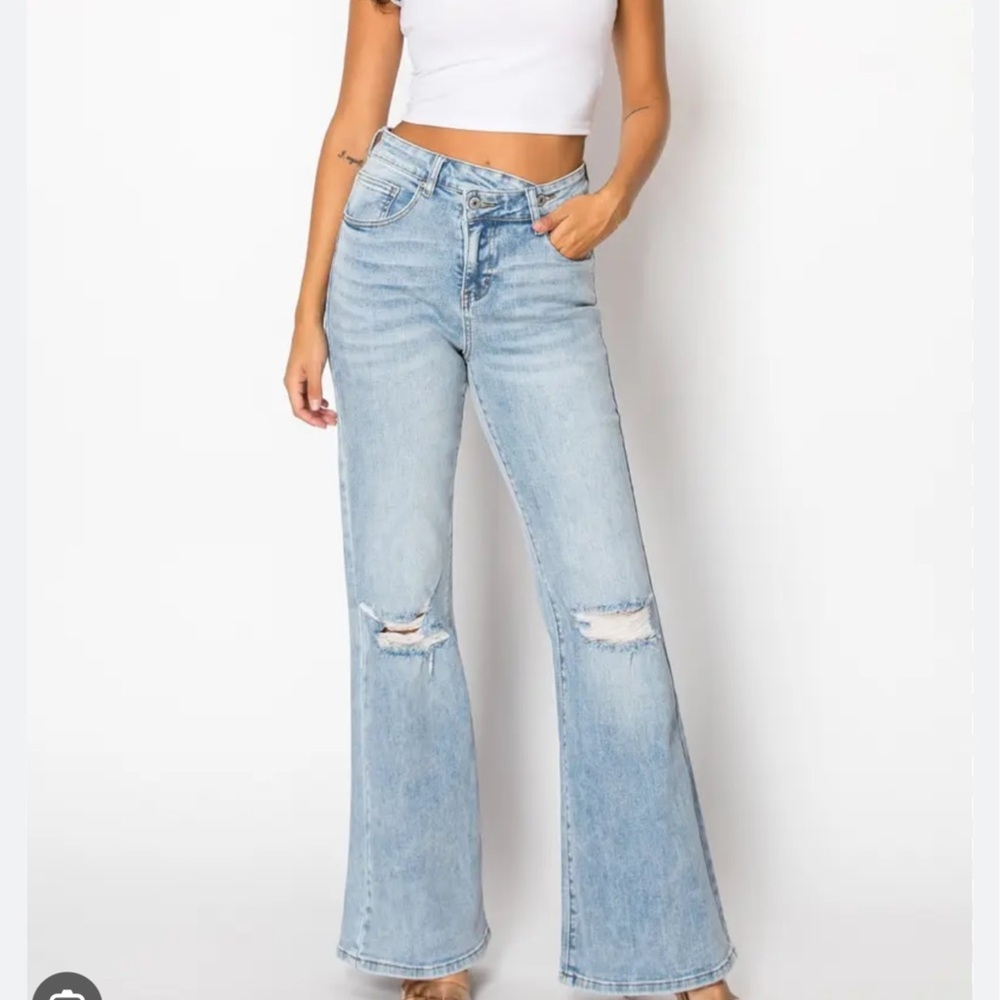 Light Wash High-Rise Distressed Flare Jeans - Women